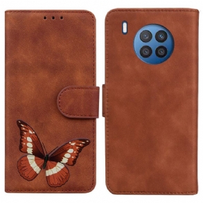 Fliptok / Bőrtok Huawei Nova 8i Skin-touch Butterfly