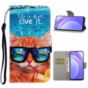 Fliptok / Bőrtok Xiaomi Redmi Note 9 Pro 5G szíjjal Cat Live It Strappy