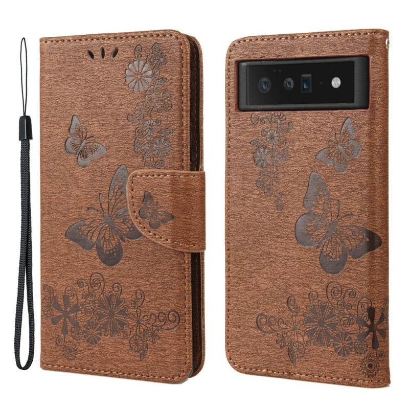 Fliptok / Bőrtok Google Pixel 6 Pro szíjjal Splendid Strap Butterflies