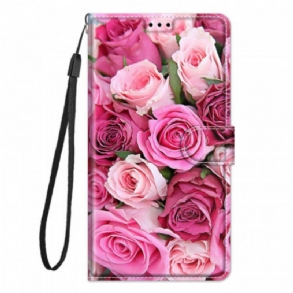 Fliptok / Bőrtok Xiaomi Redmi Note 10 Pro szíjjal Strap Roses