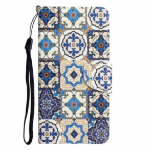 Fliptok / Bőrtok Samsung Galaxy A34 5G szíjjal Strappy Patchwork