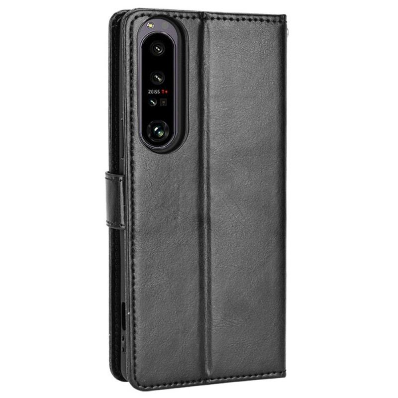 Fliptok / Bőrtok Sony Xperia 1 IV szíjjal Flashy Strappy