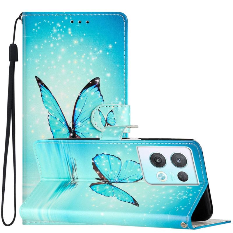 Kinyitható Tokok Oppo Reno 8 Pro szíjjal Kék Pillangók Pánttal